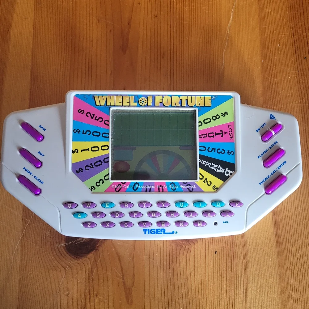 Vintage 1995 Wheel Of Fortune Handheld Game